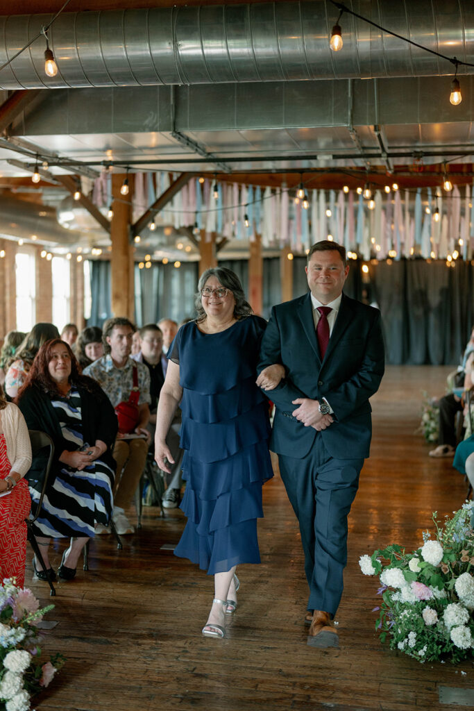 wedding party walking down aisle indoor ceremony Michigan