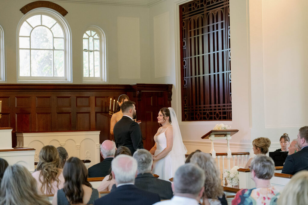 bride and groom exchanging vows historic chapel Dearborn Michigan