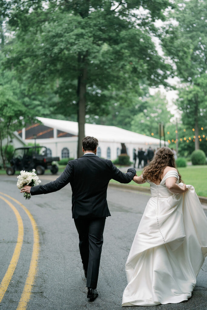 joyful bride and groom candid moment outdoor wedding portrait Michigan