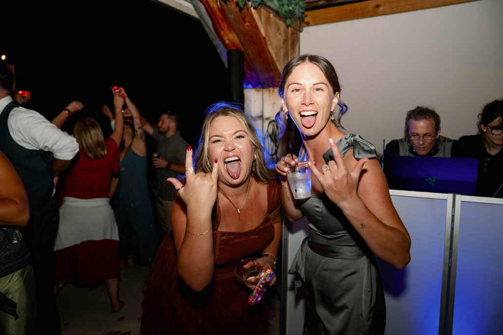 wedding guests celebrating during reception at Nugent Orchards in Frankfort Michigan