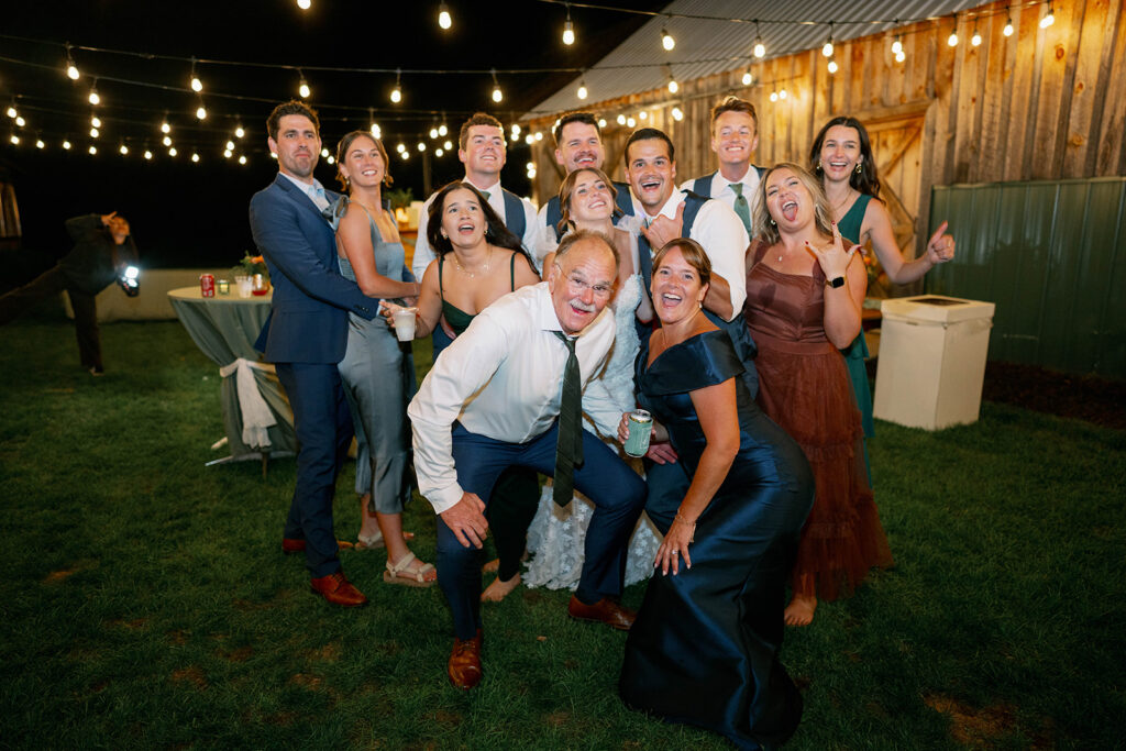 group photo during wedding reception at Nugent Orchards