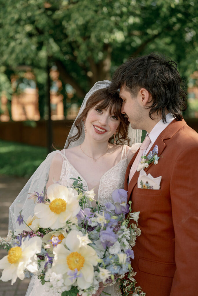 romantic couple portrait with bouquet Record Box Loft Michigan