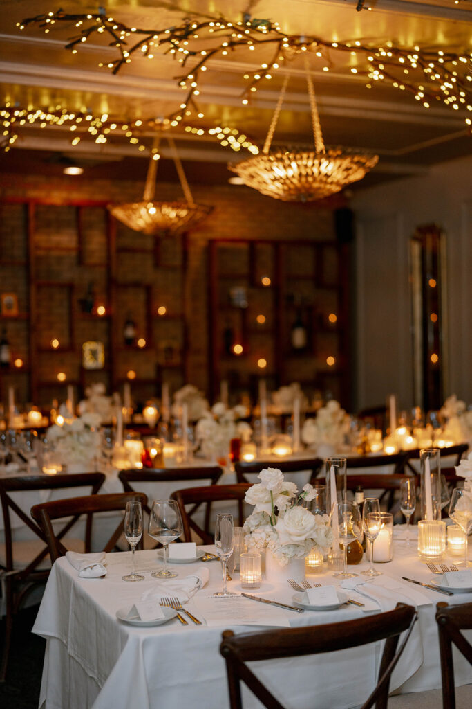 candlelit wedding reception room with chandeliers at Cafe Cortina in Dearborn Michigan
