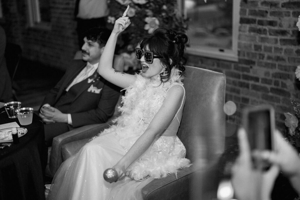 bride dancing candid black and white reception moment